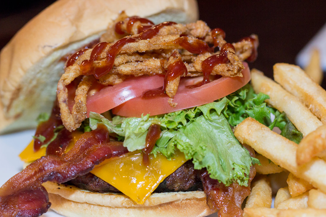 Close Up of Hamburger and Fries